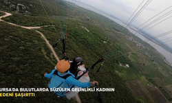 Bursa'da bulutlarda süzülen gelinlikli kadının nedeni şaşırttı